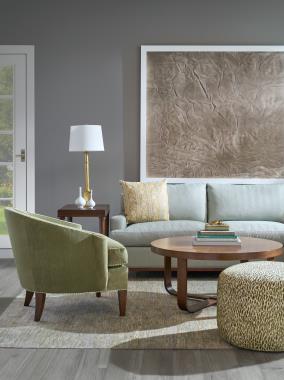 Room Scene: HC122-56 9th Street Sectional shown in HC2702-32 body fabric with throw pillows shown in HC810-27 fabric and Truffle finish, HC5377-51 Finley M2M End Table shown in Java finish with Walnut top, HC8584-70 Beatrice Cocktail Table shown in Truffle finish, PE6517-50 Maisie Ottoman shown in HC448-78 fabric and PE6707-22 Ember Exposed Wood Lounge Chair shown in HC4324-74 fabric with HC426-72 welt and Truffle finish.