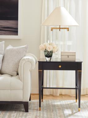 Room Scene: HC3014-05 Parker Sofa shown in optional Ebony finish, body in fabric HC328-10 and standard throw pillows in HC337-11 and HC318-13 and HC3086-70 Bill Side Table shown in optional Kohl finish with Solid Dark Gold striping and Golden Brass knob and Ferrules.