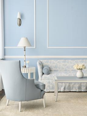 Room Scene: HC713-51-5 Addie M2M® Chair / Sofa with Box Pleat skirt shown in HC510-35 body fabric with HC457-32 welt and bolsters shown in HC457-32 fabric with HC3240-10 welt; HC4617-29 Amanda Stool shown in HC522-75 fabric with HC192-32  welt and bottom COT; HC1506-24 Cantrell Chair shown in HC11 Colours leather with Dove White finish: HC2490-51 Milo M2M® Cocktail Table 24” x 60” shown in Dove White finish with Solid Blue Striping and HC11 Colours leather on top inset and HC4506-70 Scalla Side Table shown in Dove White finish.