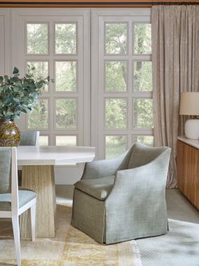 Room Scene: HC8644-10 Lark Pedestal Base & HC8643-72 Lark Dining Table Top shown in Ivory finish, HC8507-01 Oletta Skirted Dining Chair shown in HC480-72 fabric, HC8691-70S Maxime Console with Stone Top shown in Clear Coat finish and HC8511-02 Loretta Dining Chair shown in HC480-72 fabric and Cream Linen finish.