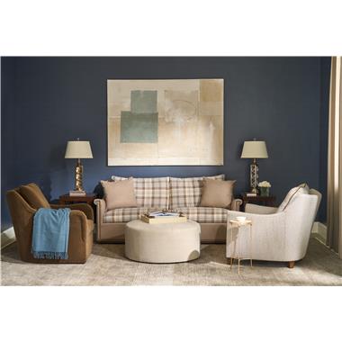 Room Scene: HC9509-S1 Jules Mid Sofa -(AR4) Key Arm, (B5) Wood Trim Base, 
(BX) Box Border shown in 235-82 body/throw pillow fabric with Back/Seat cushion in HC451-84 fabric and Natural nail trim and Java finish, HC9509-SW Jules Swivel Chair - (AR3) Saddle Arm, (B3) Uph. Base Swivel, (KE) Knife Edge Weltless shown in HC3118-88 fabric, HC9509-CH - (AR5) Flare Arm, (PC) Pleat Corner Welt, 
(B2) Tapered Leg Base shown in HC470-86 fabric with HC3118-88 welt and Java finish, HC130-30 Saturn Round Ottoman shown in HC470-86 fabric and HC4751-51 Tessa M2M End Table shown in Tortoise finish.