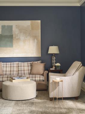 Room Scene: HC9509-S1 Jules Mid Sofa -(AR4) Key Arm, (B5) Wood Trim Base, 
(BX) Box Border shown in 235-82 body/throw pillow fabric with Back/Seat cushion in HC451-84 fabric and Natural nail trim and Java finish, HC9509-CH - (AR5) Flare Arm, (PC) Pleat Corner Welt, 
(B2) Tapered Leg Base shown in HC470-86 fabric with HC3118-88 welt and Java finish, HC130-30 Saturn Round Ottoman shown in HC470-86 fabric and HC4751-51 Tessa M2M End Table shown in Tortoise finish.