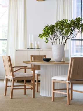 Room Scene:  HC1346-70 Landers Dining Table shown in Dove White paint base with Scrubbed Ash top, HC1312-01 Aix-en-Provence Arm Chair and HC1312-02 Side Chair shown in optional Clear Coat Lacquer in fabric HC2393-10 and HC1393-70 Verdun Tall Cabinet in Alabaster paint.