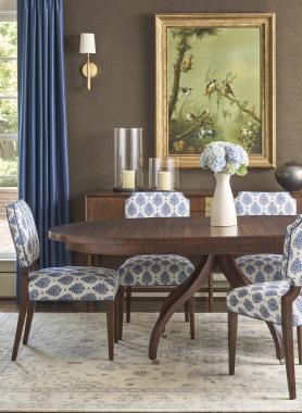 Room Scene: HC182-71/HC181-71 Ingold Round Dining Table shown in American Antique finish, HC4616-02 Cove Dining Chair shown in HC500-35 fabric with HC149 welt and American Antique finish and HC248-70 Felix Buffet shown in American Antique finish.